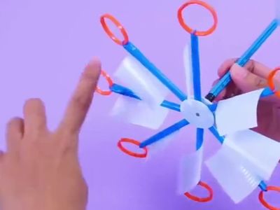 低年级环保作品:DIY塑料小风车图解
