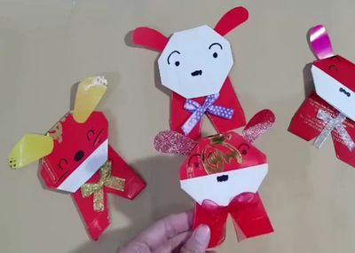 红包袋做可爱的贺年小狗狗折纸做法