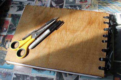 使用废旧木板DIY垫板记事簿的图解制作教程