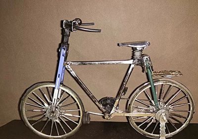 废雨伞DIY手工制作的小小自行车