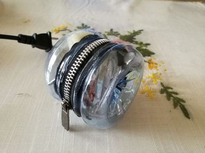 饮料瓶做耳机收线器小包教学