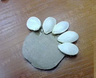 南瓜籽做小朋友手工作品菊花教程