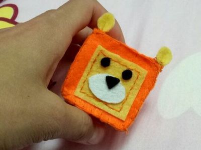 手工布艺制作安全沙包，DIY小狮子方形沙包教程