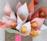 用彩纸和包装纸DIY漂亮礼品盒装饰花的做法