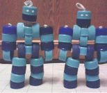 饮料瓶盖再做手脚可以活动的机器人玩具