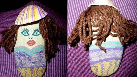 用鹅卵石和废毛线做手绘人偶