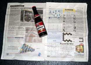 怎么利用旧报纸开啤酒瓶盖
