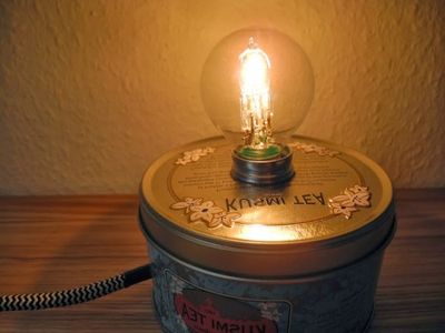 废铁罐的用途之环保台灯的做法